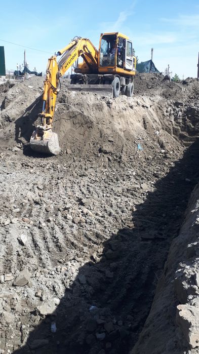 махсус техника экскаватор хизмати бухоро ш