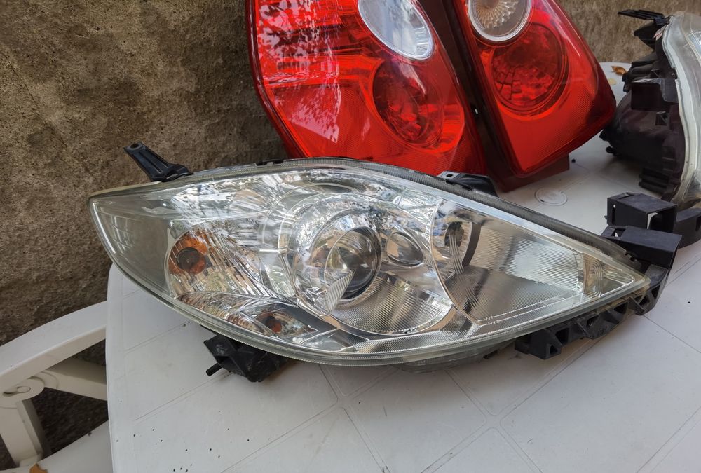 Фарове Mazda 5.Стопове Голф 5. . Пежо 307 комби. Рено Сценик 2