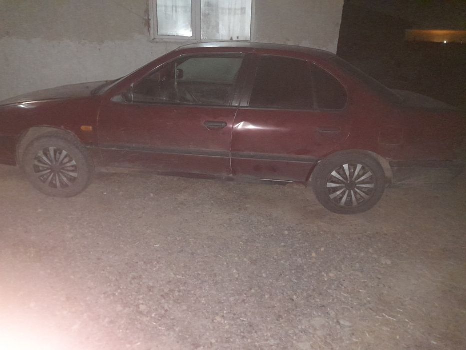 Ниссан примера...