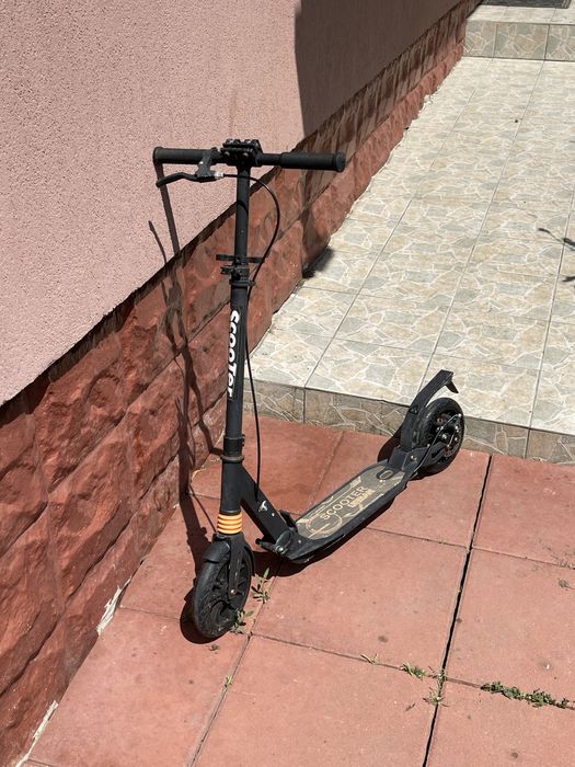 Trotineta cu frana pe disc