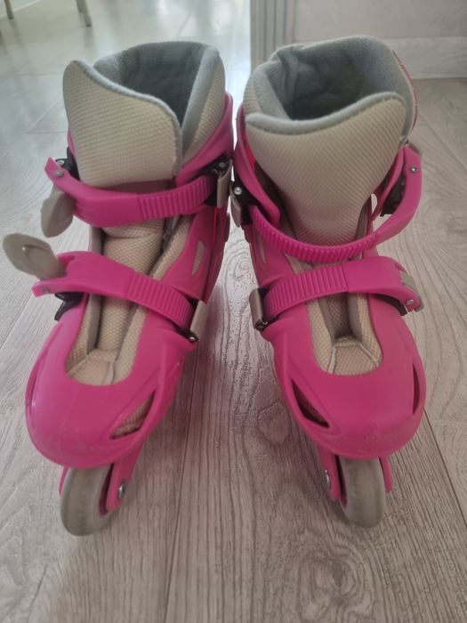 Роликовые коньки