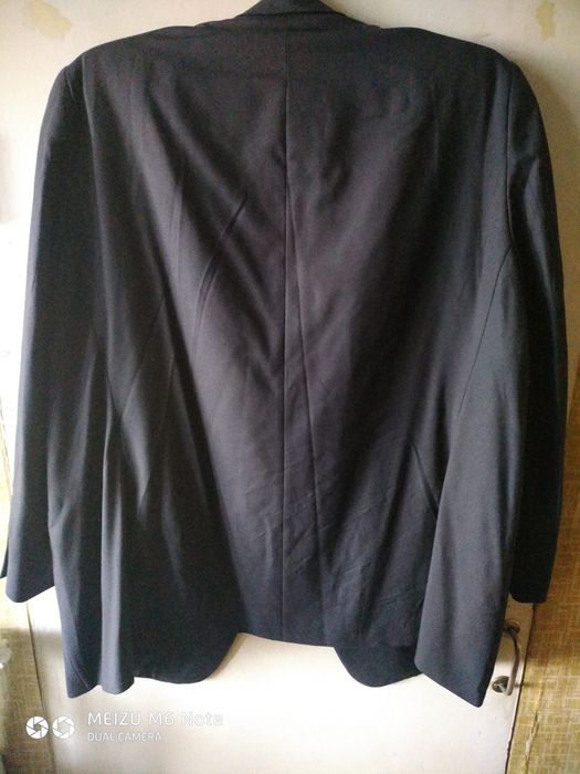 Пиджак большого размера.