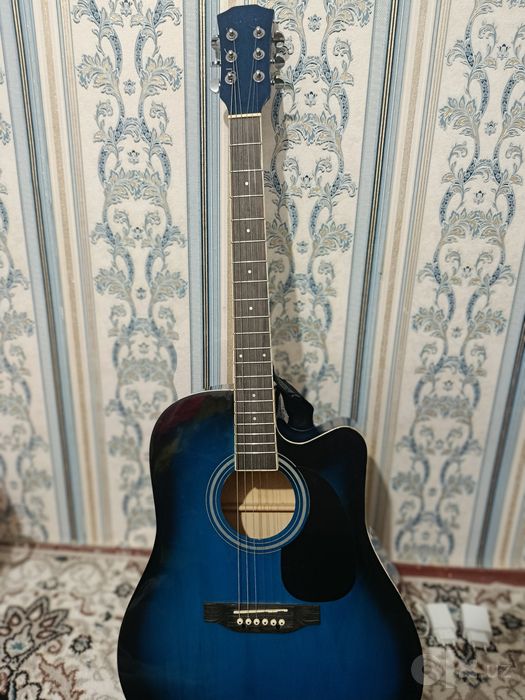 Gitara sotiladi 1 million 300 ming sum holati yangi ishlatilmagan!