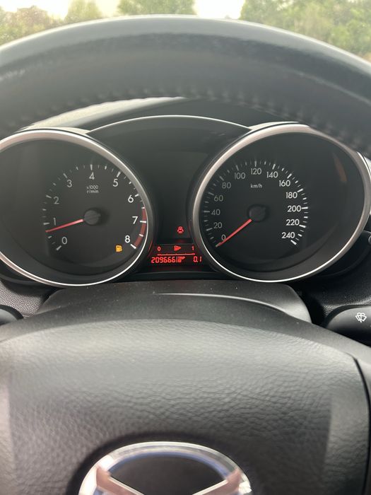 Mazda 3 1,6 benzina 105 cp 2010