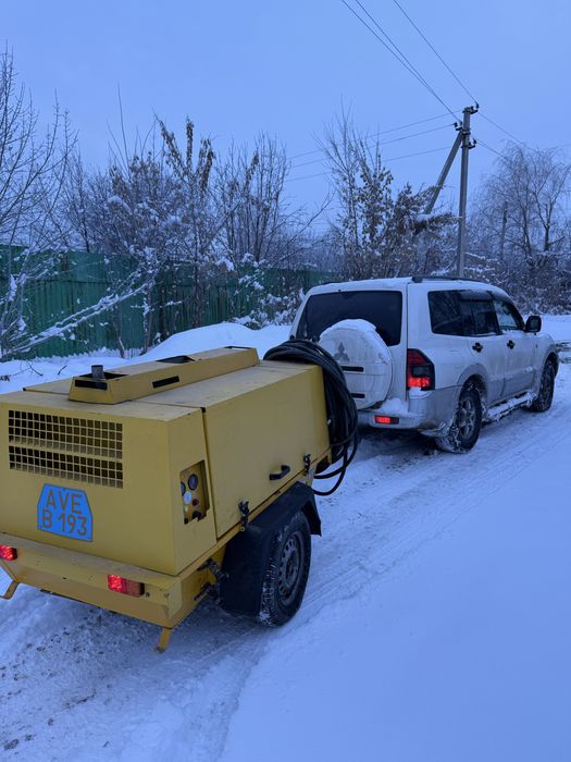 Компрессор с молотками