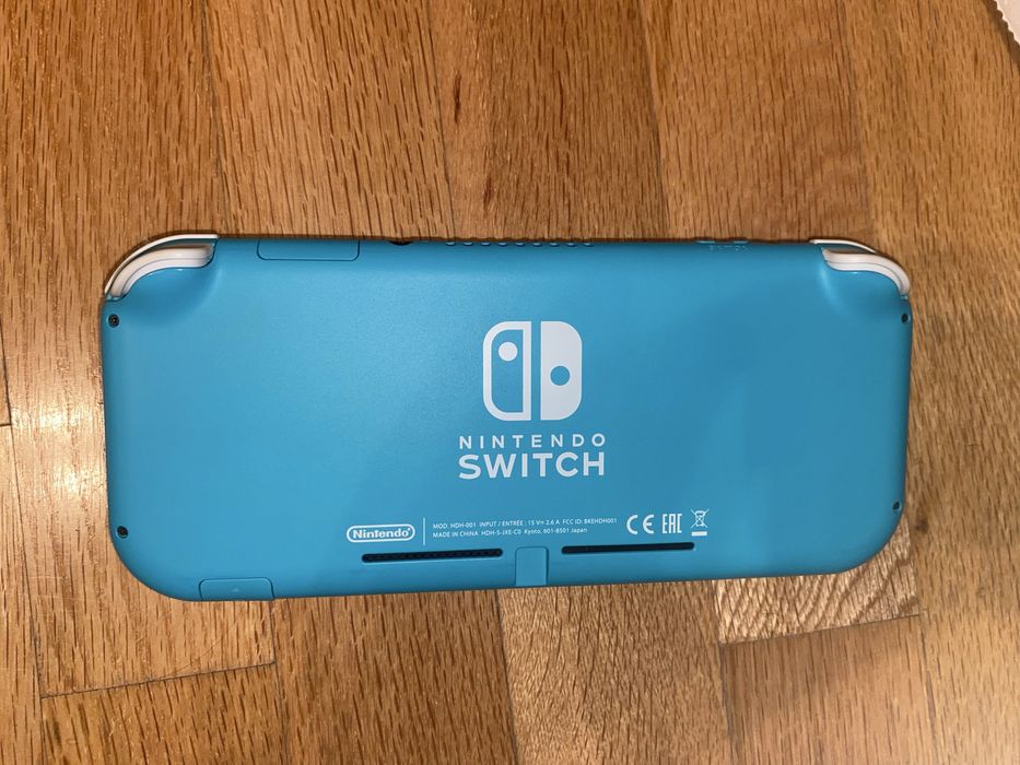 Nintendo switch lite + joycons + 128gb sd crad + Mariokart 8 Delux