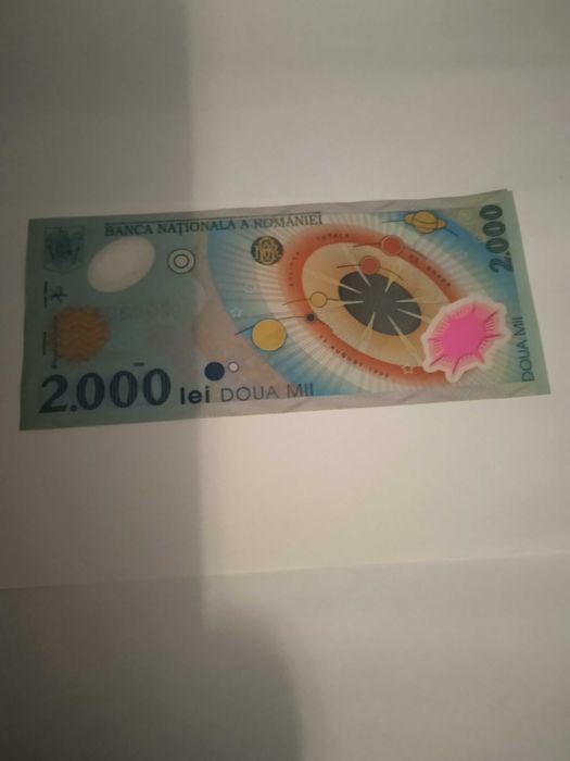Bancnota de colecție, cu eclipsa, de 2000 lei, din 1999