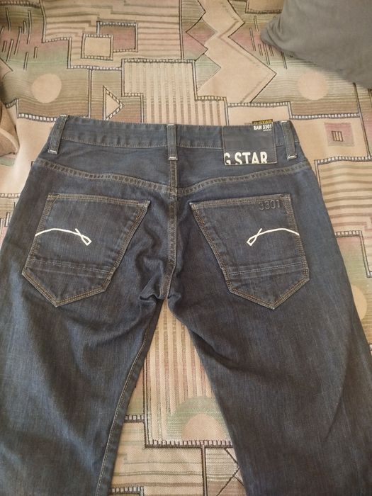 Фирменные джинсы