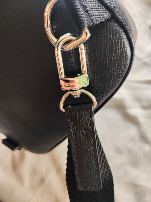 Louis Vuitton sling bag taiga