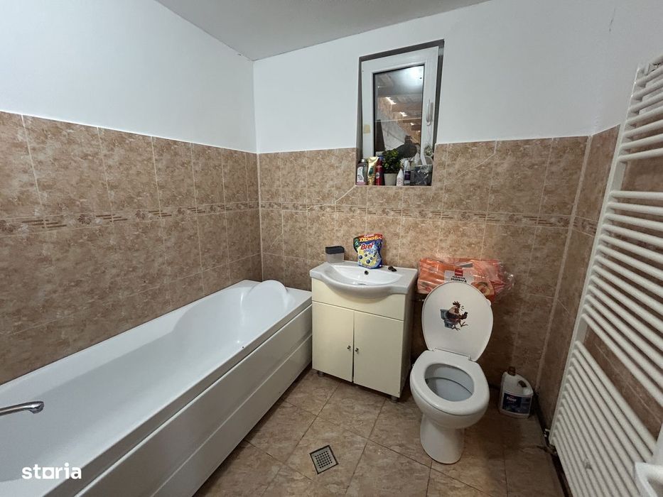 Vand casa din caramida, st.494 mp, sc.131 mp, cu 4 cam.2 bai, moderna