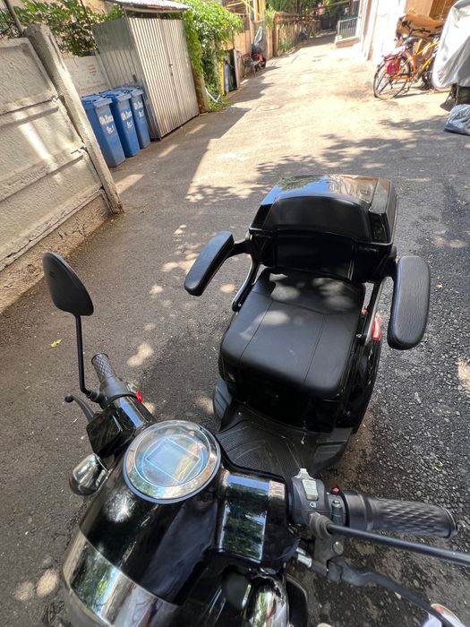Scuter electruc pentru persoane cu dizabilitați