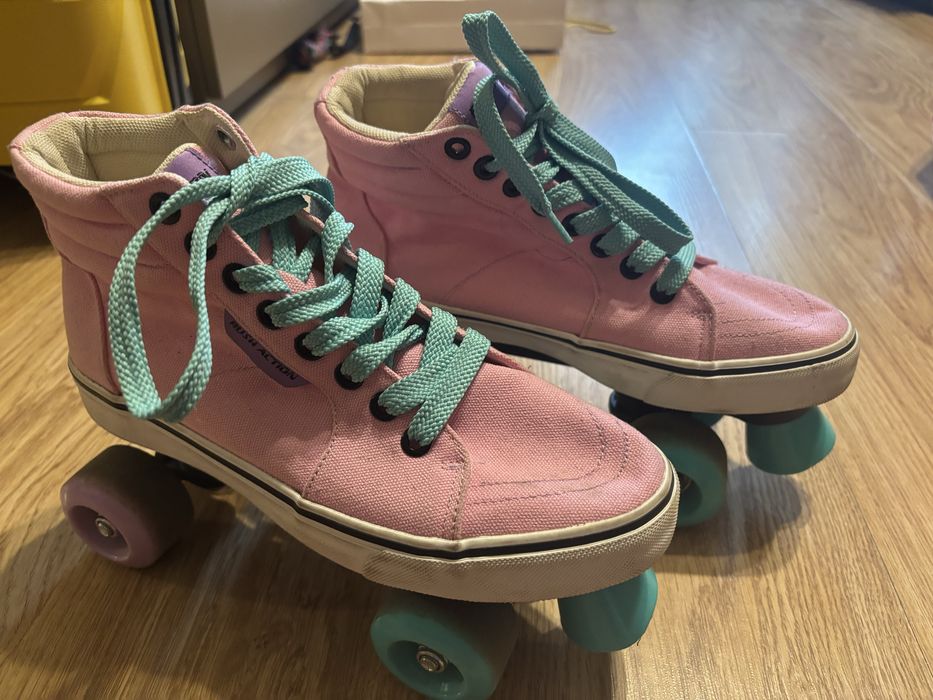 Роликовые коньки