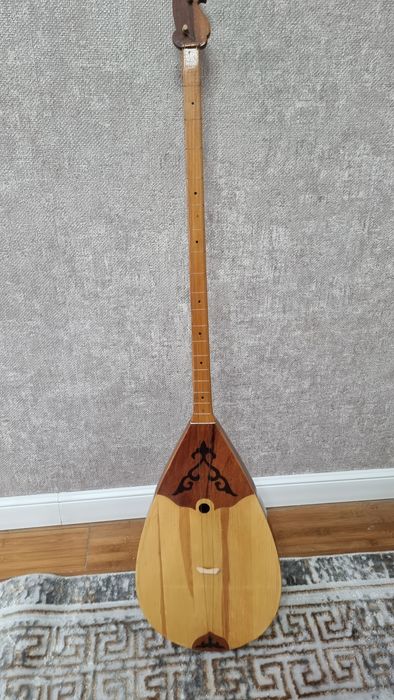 Домбыра сатамын сыртқы қабы сыйлыққа