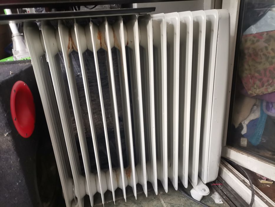 Calorifer electric cu ulei cu 14 elemenți perfect funcțional