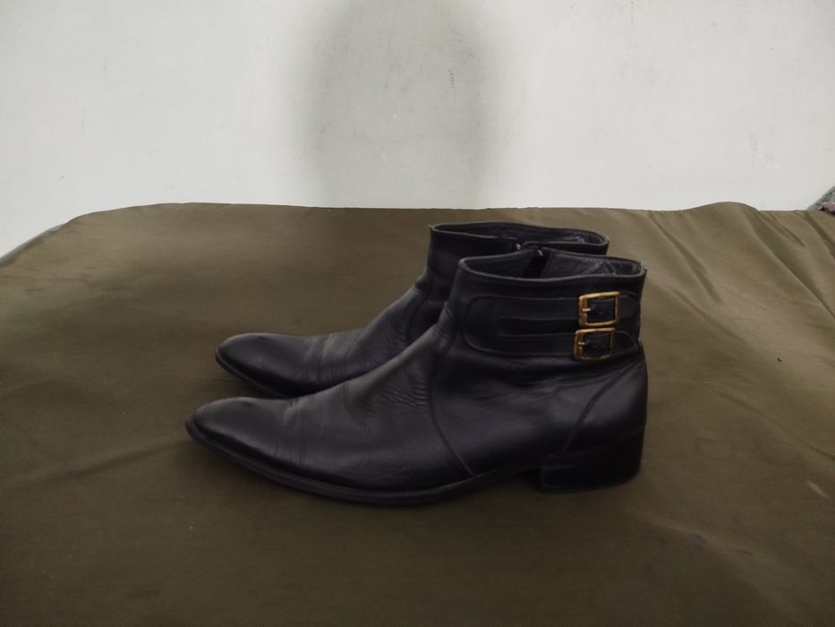 Продам фирменные сапоги.