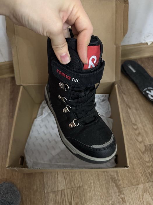 Продам детские сапоги Reima