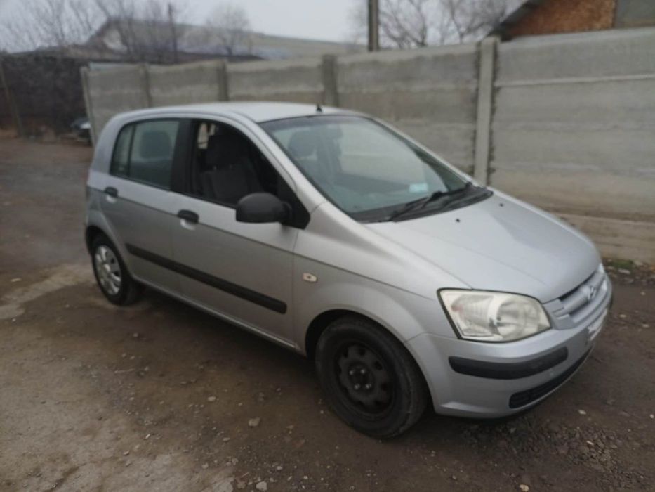 Dezmembram Hyundai Getz 1.3 B usa fata dreapta/usa spate dreapta/bara spate
