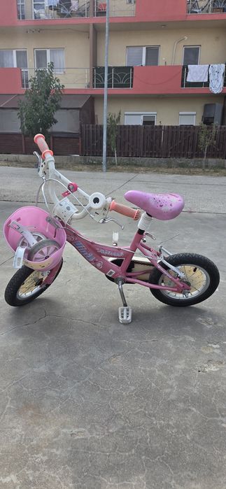 Bicicleta cu roti ajutatoare