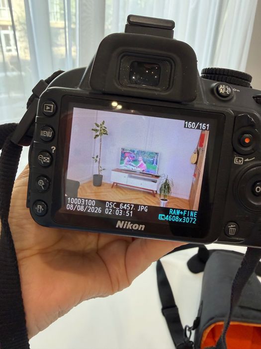зеркальный фотоаппарат Nikon D3100