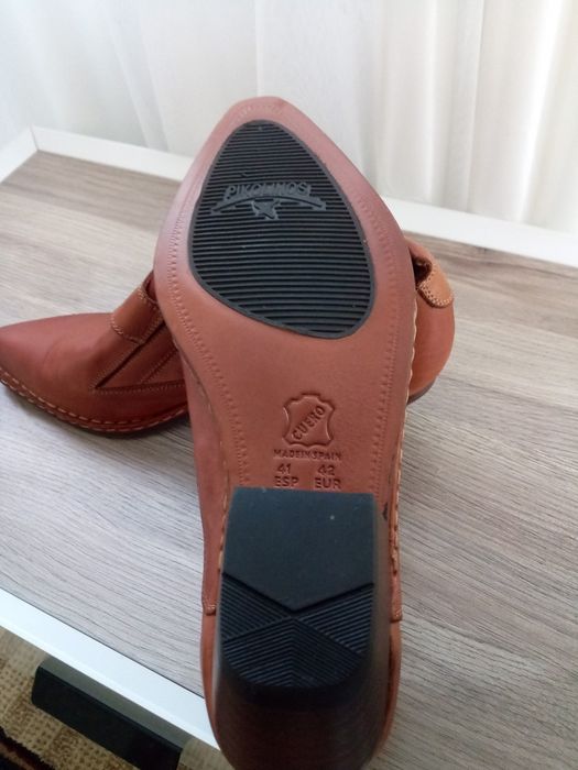 Продам кожаные казаки.