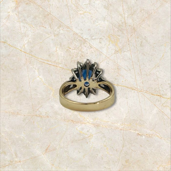 Луксозен златен пръстен 14К със сапфир и диаманти