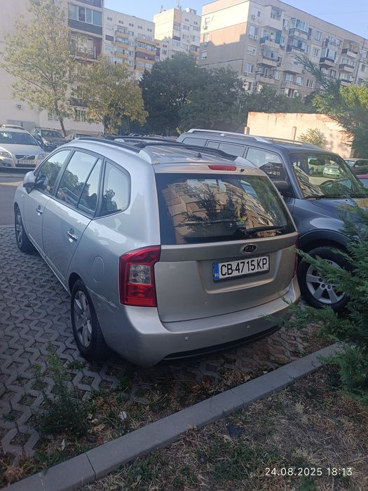 Kia carens  бензин/газ