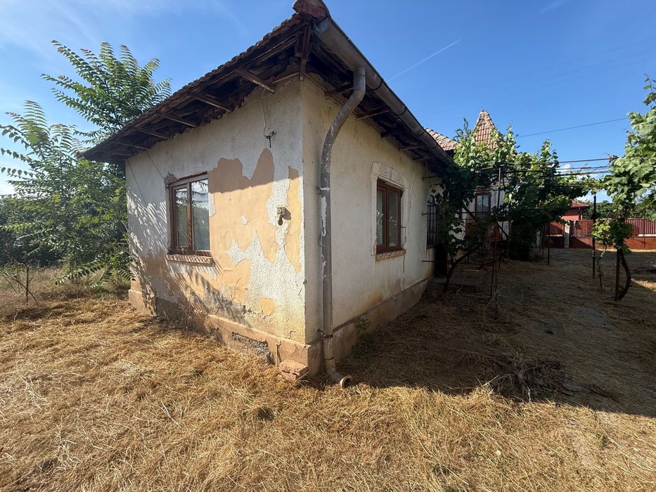 Vând casă în Comuna Giubega