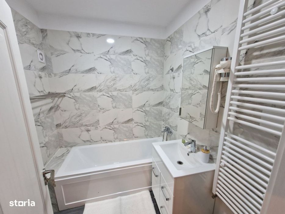 Apartament 74 mp, 2 bai, mobilat complet la 1.547 €/mp. Te muti d
