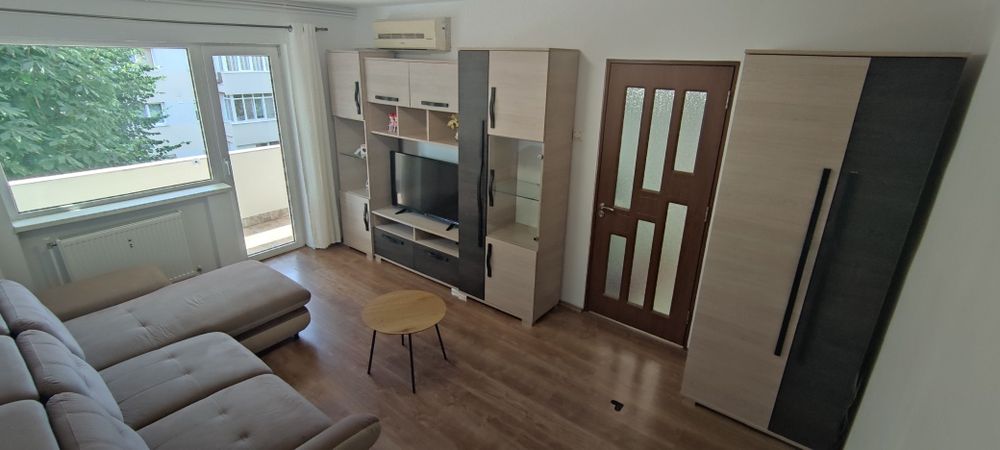 Apartament cu 3 camere + loc de parcare