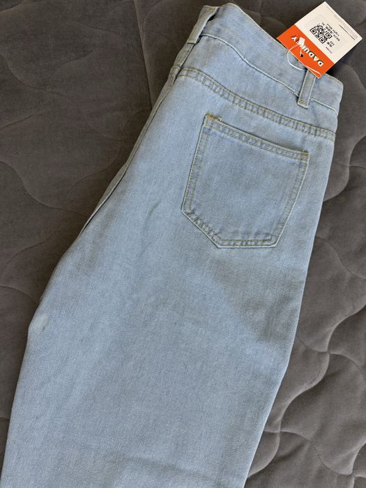 Джинсы новые