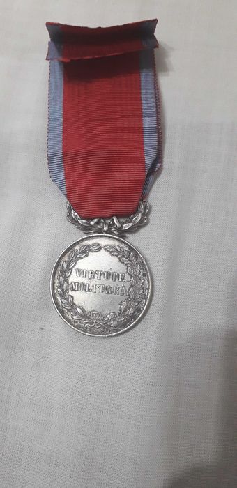 Medalia Virtutea Militară cl II-a.
