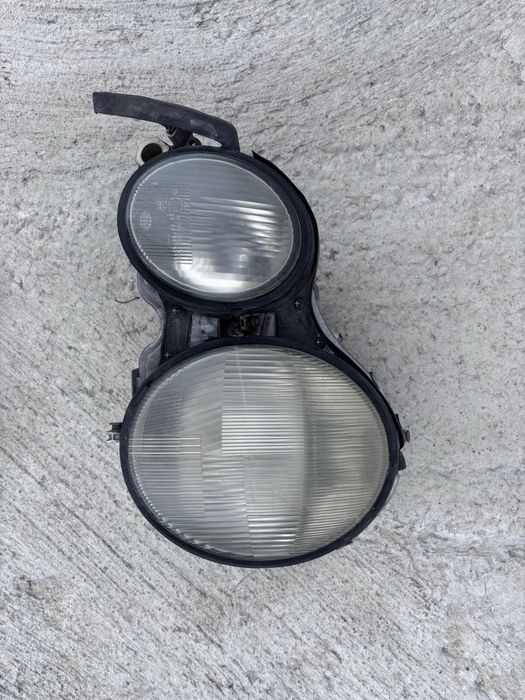 Фара на Мерседес  210 дорестпйлинг левая