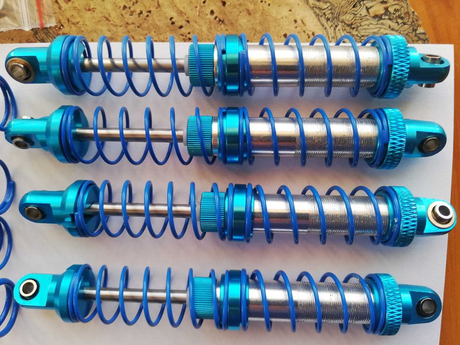 Automodel 4 amortizoare BDX aluminiu 100mm+garnituri, arcuri,accesorii