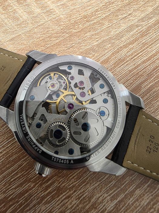Часовник TISSOT SKELETON  T070405A