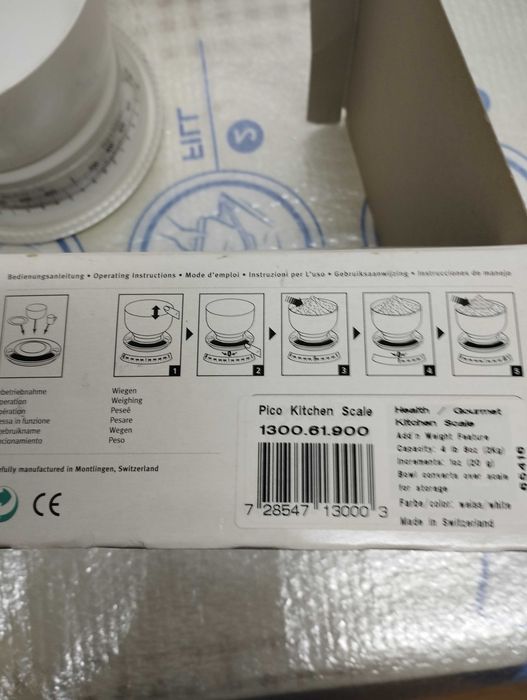 cântar de bucătărie Exacta by Soehnle, cu un design alb și un cadran care masoara cu precizie in kg si lb