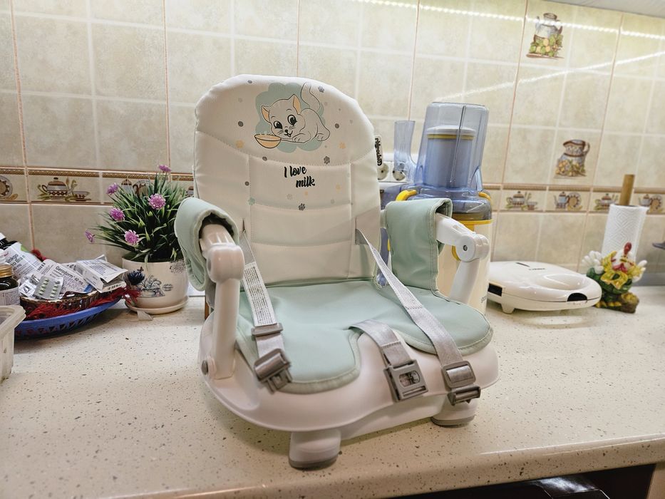 Înălțător scaun de masa Chipolino Lollipop avocado