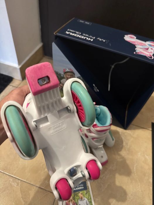 Patine cu rotile mărimi reglabile 26-29 - Roz, stare foarte buna.