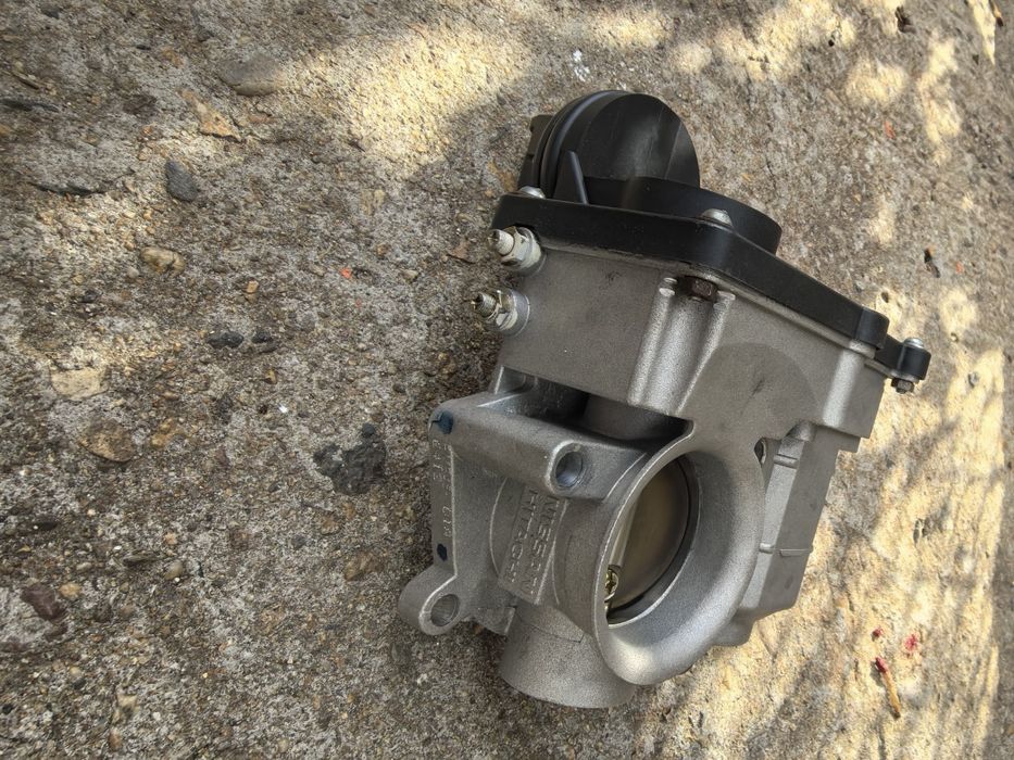 Дросел за Nissan note/micra