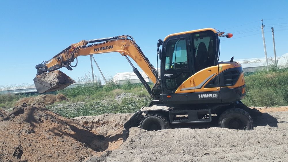 махсус техника экскаватор хизмати бухоро ш