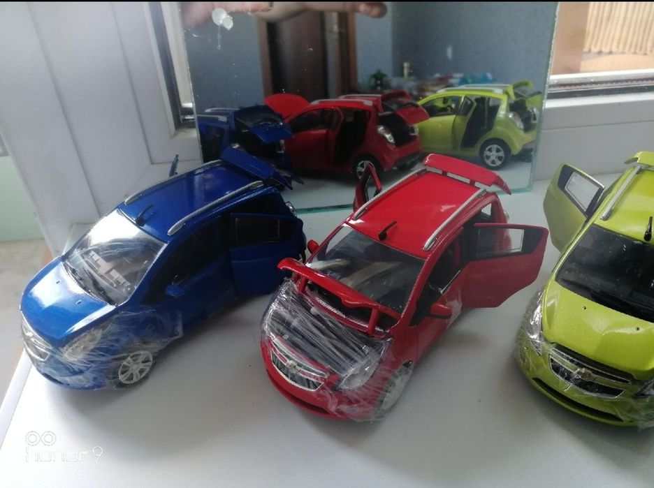 Модель автомобиля Chevrolet Spark 1:24