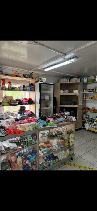 Ofer spre vanzare casa de locuit +spatiu comercial