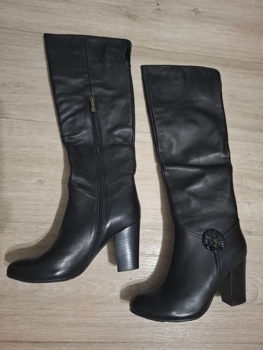 Продам новые сапоги