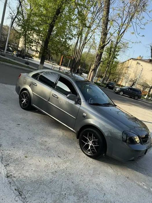 Ласетти 2013 1.6 мотор Мокрый асфальт, Тулик шумка килинган.