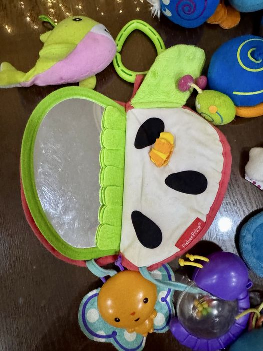 Подвесные игрушки в коляску манеж