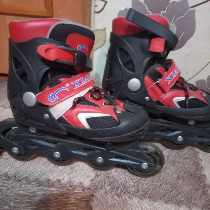 Роликовые коньки