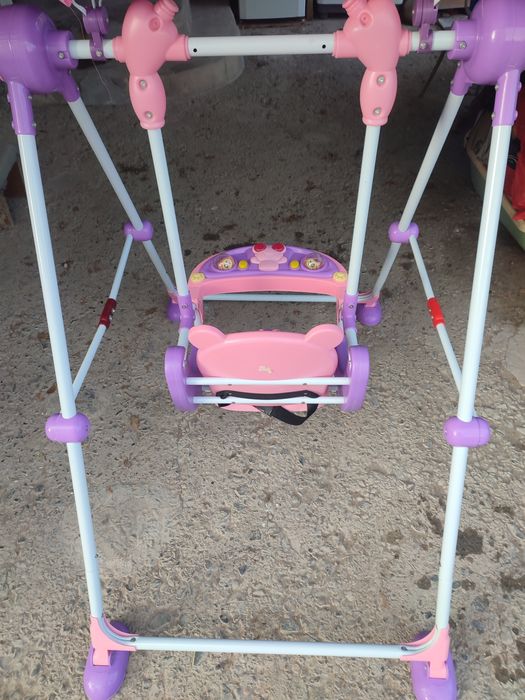 Детская качеля розовая