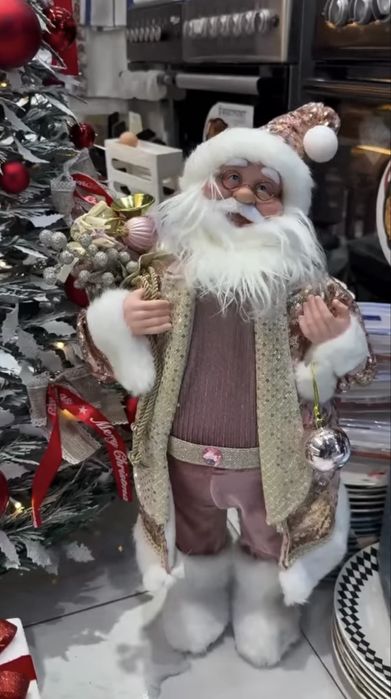 Голям Дядо Коледа с мелодия и мърдаща се глава 50см с шапка