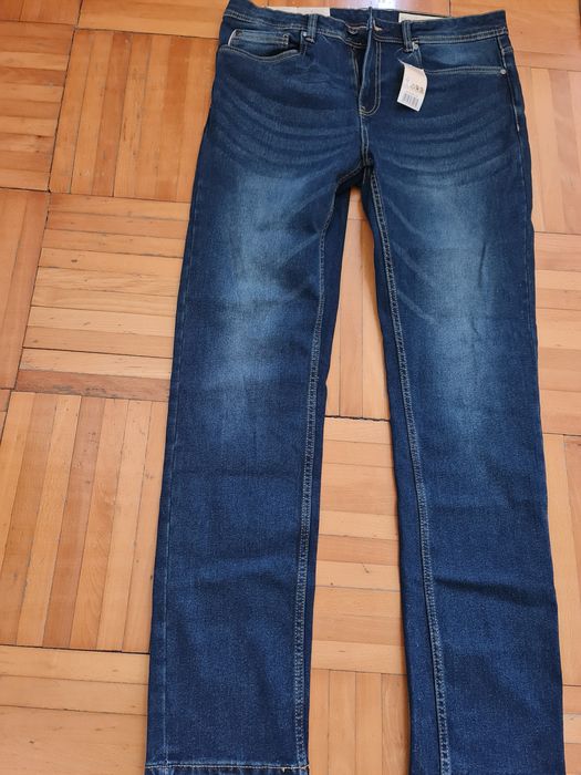 Blugi albastri noi marimea L/50