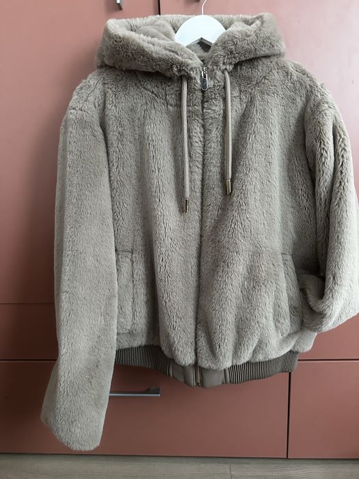 Преходно пухкаво яке