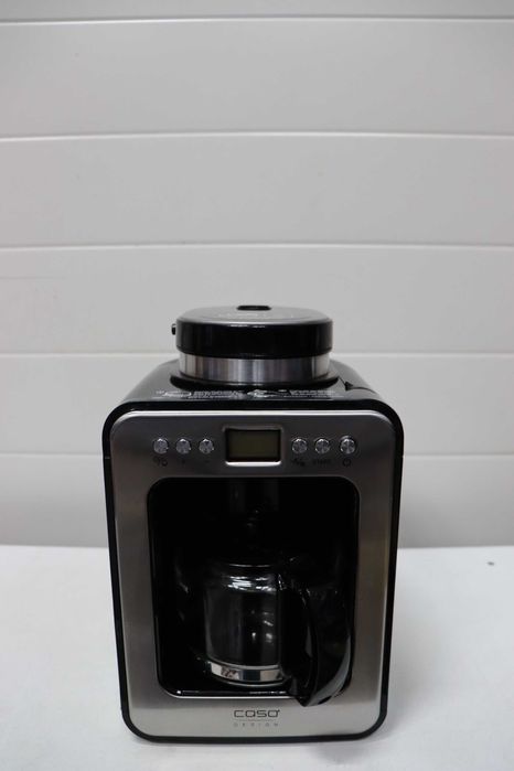 Компактна шварц кафемашина CASO Coffee с мелачка, 4 чаши кафе, подходяща и за предварително смляно кафе, LCD дисплей, таймер